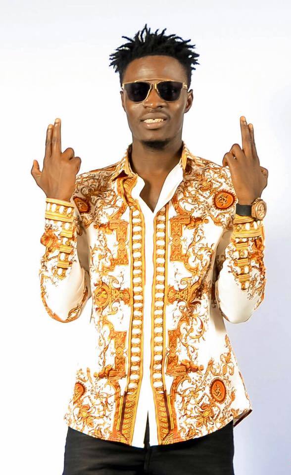 Ghanaian music artist Fancy Gadam performing live on stage