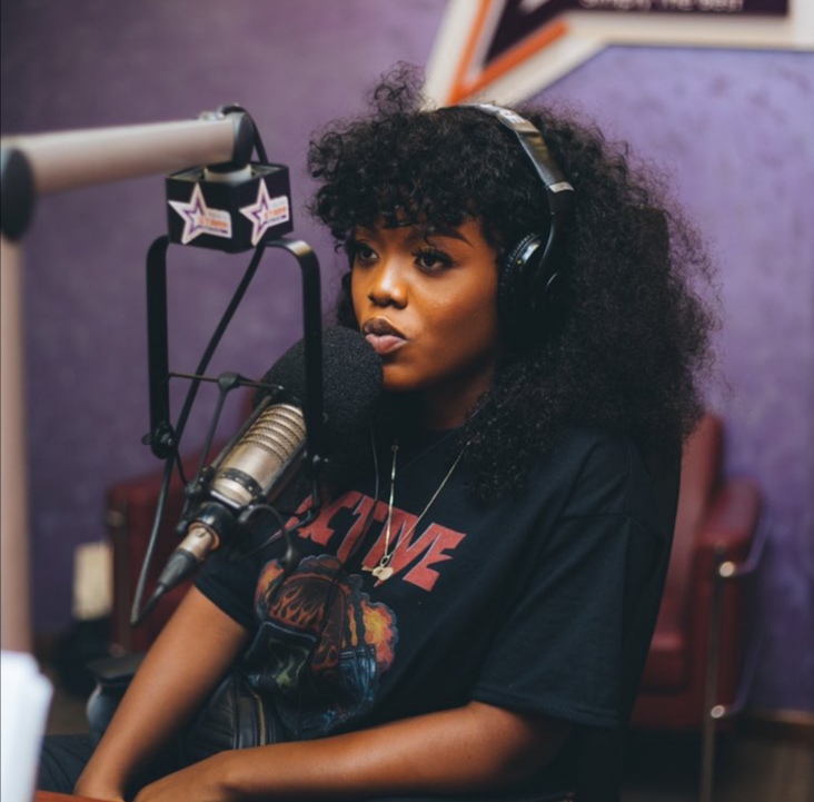 Gyakie performing live at the OkayAfrica Culture Cafe in Ghana
